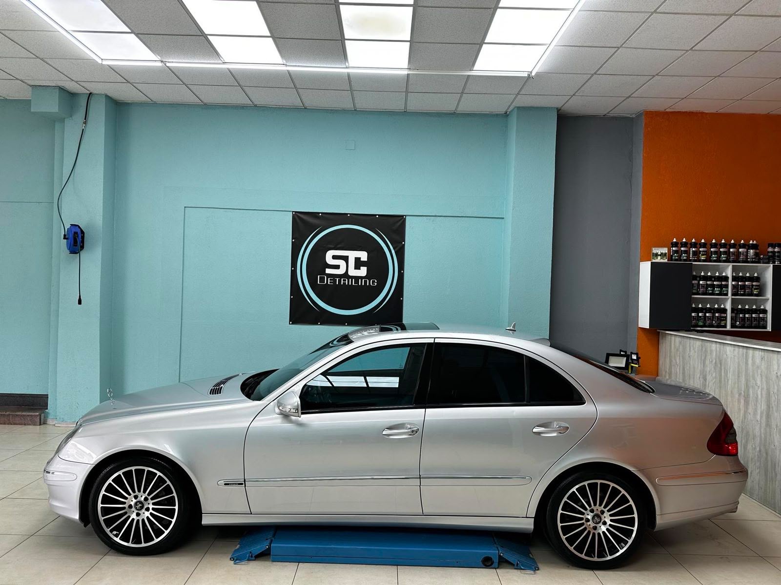 Silver Mercedes-Benz E-Class W211 rental car side profile, car hire Tirana